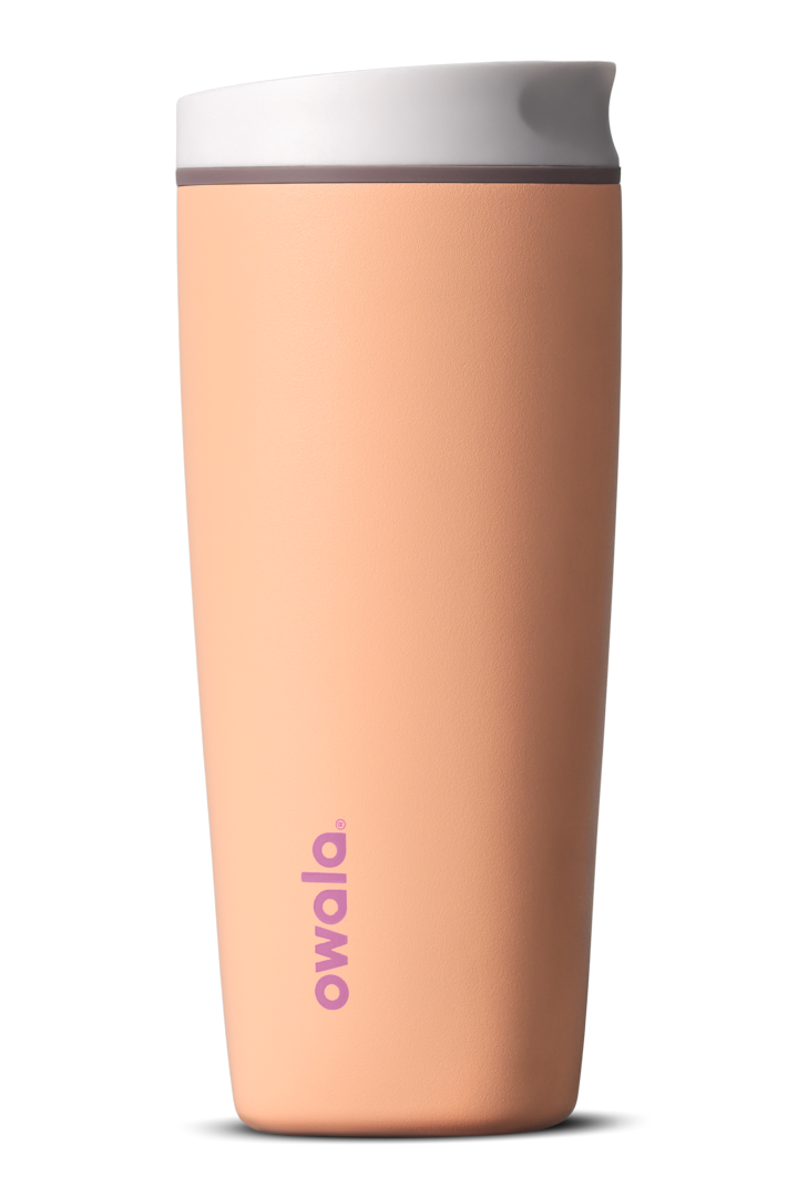 Owala SmoothSip Slider 20oz in Peachy Keen, peach insulated stainless steel body with white lid and light purple Owala logo